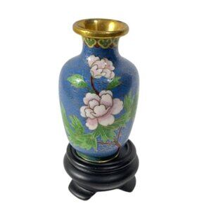 Chinese blue cloisonne and brass vase with wooden stand.